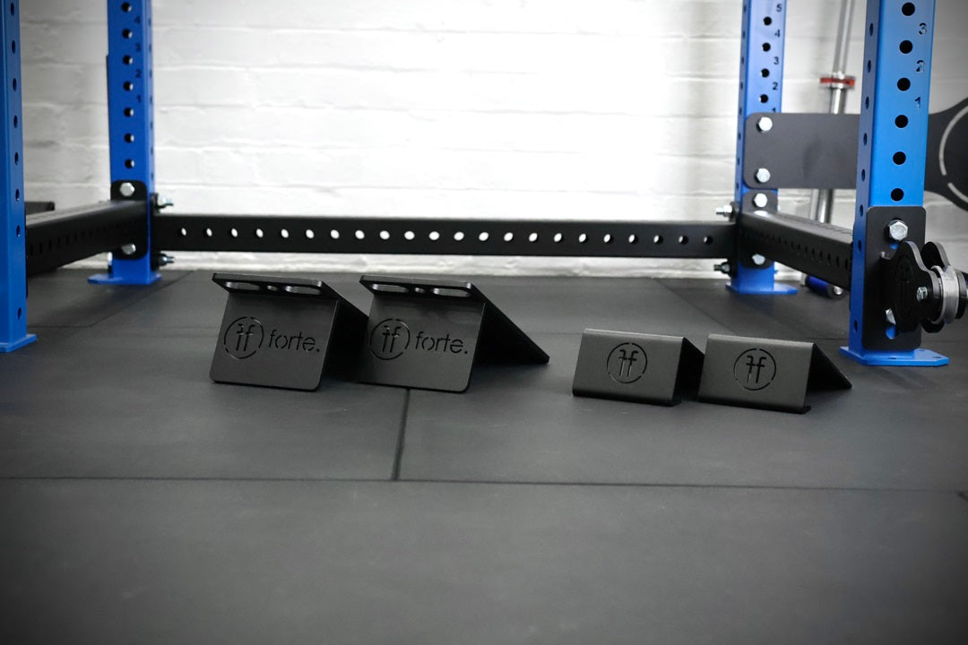 set of slant blocks and slant doubles positioned in the middle of a squat rack